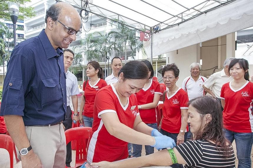 Deputy Prime Minister and Minister for Finance Tharman Shanmugaratnam&nbsp;interacting with members from voluntary welfare organisations at the&nbsp;Taman Jurong Zone E RC Healthy Lifestyle Day on Sunday, Oct 26.&nbsp;A five-year, $30 million initiat