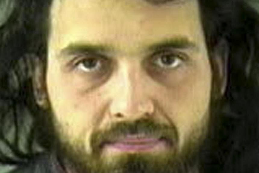 Michael Zehaf-Bibeau, 32, is seen in an undated picture from the Vancouver Police Department released by the Royal Canadian Mounted Police. -- PHOTO: REUTERS&nbsp;