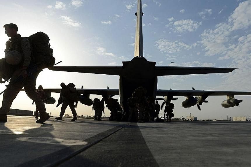 US Marines arrive in Kandahar on Oct 27, 2014, as British and US forces withdraw from the Camp Bastion-Leatherneck complex in Helmand province.&nbsp;A fleet of planes and helicopters airlifted the last US and British forces from a key southern provin