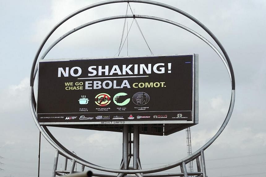 A billboard that raises awareness and fight against Ebola is seen in Lagos on Oct 27, 2014.&nbsp;A new mobile telephone based mapping service has been created in a bid to track Ebola and better help communities hit by the virus in west Africa, develo