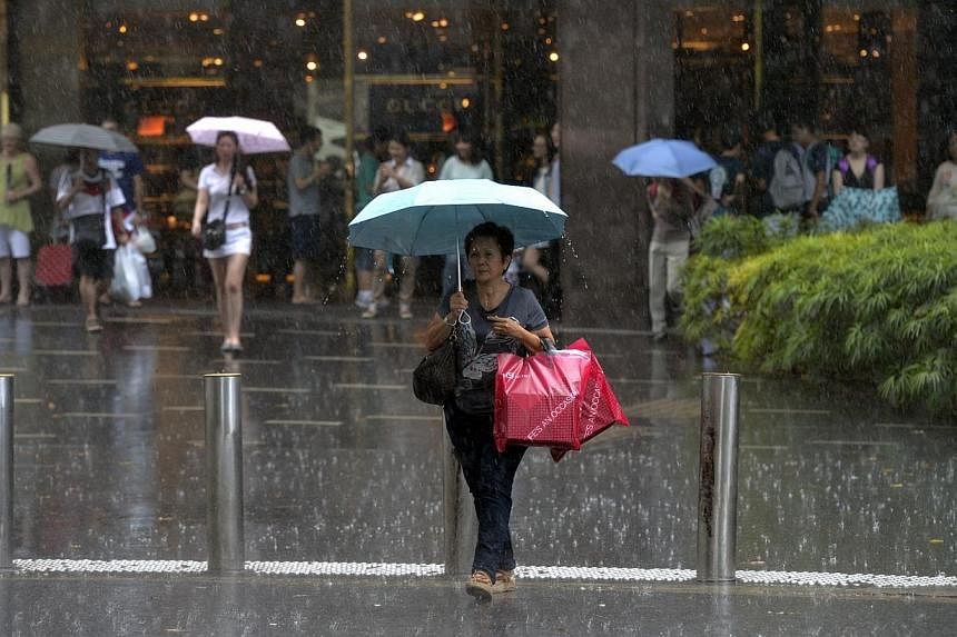 Singapore can expect more rain and less haze in the coming weeks with the south-west monsoon season transitioning into inter-monsoon conditions. -- PHOTO: ST FILE