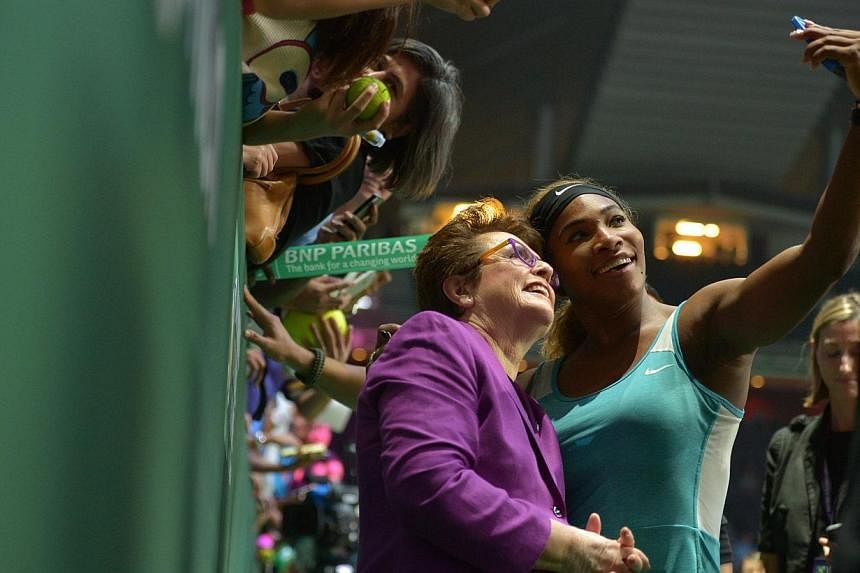 Serena Williams and Billie Jean King take a selfie together after the WTA Finals held at the Singapore Indoor Stadium on Oct 26, 2014. -- ST PHOTO: CAROLINE CHIA