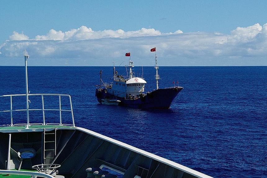 Japan's coastguard said it arrested the captain of Chinese fishing boat Zheling Yuyun 622 (pictured) on&nbsp;Monday on suspicion of coral poaching after a high seas chase in the country's exclusive economic zone. -- PHOTO: AFP