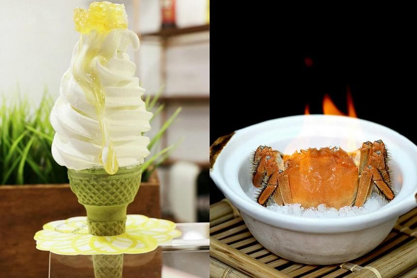 A Honey Comb cone from Taiwanese brand Honey Creme (left) and flaming hairy crab with sea salt (right) served in a claypot from Royal Pavilion. -- PHOTOS: HONEY CREME/ROYAL PAVILION
