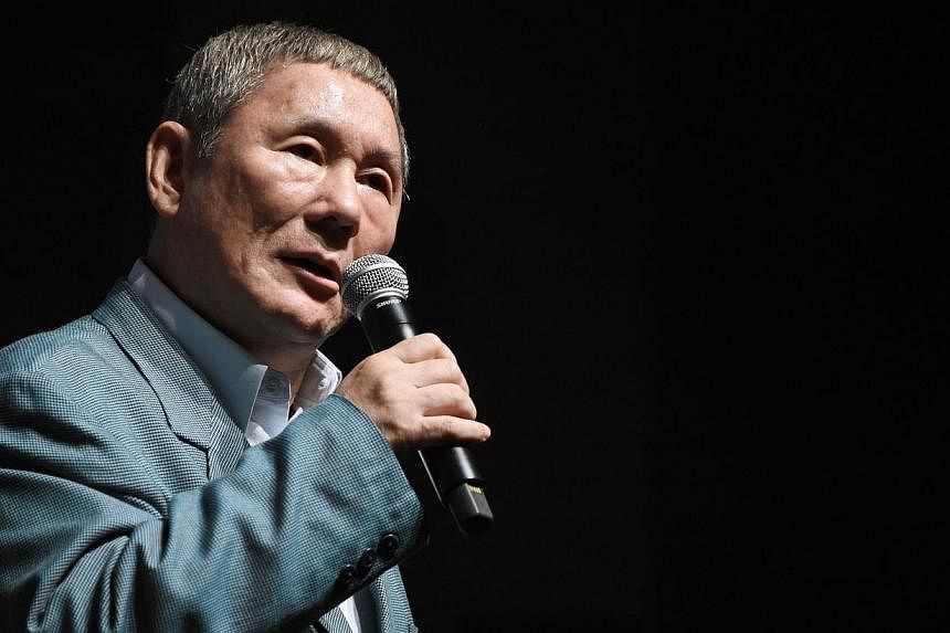 Japanese film icon Takeshi "Beat" Kitano recently appeared on stage to take questions from the audience at the ongoing Tokyo International Film Festival, after being given the first-ever Samurai Award for cultural achievement. -- PHOTO: AFP