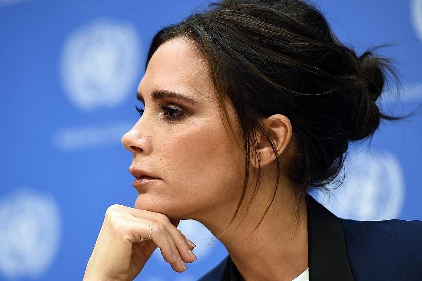 Former Spice Girl Victoria Beckham heads a list of Britain's 100 most successful entrepreneurs of 2014. -- PHOTO: AFP