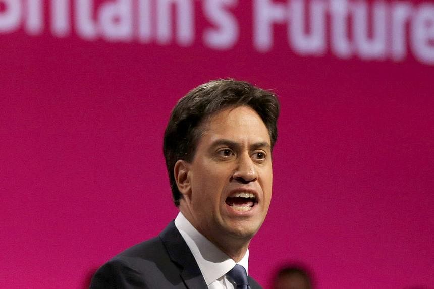 The leader of Britain's opposition Labour Party, Ed Miliband, speaks at the party's annual conference in Manchester, northern England, on Sept 23, 2014. -- PHOTO: REUTERS