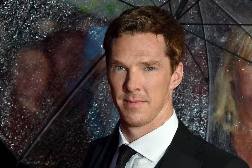 British actor Benedict Cumberbatch poses for pictures as he arrives for the BFI London Film Festival's premiere of The Imitation Game at the Odeon Leicester Square in central London, on Oct 8, 2014. -- PHOTO: AFP
