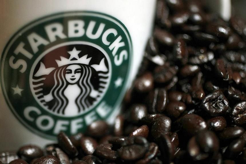 An overwhelming majority of readers who responded to an online poll by The Straits Times thought that Starbucks did the right thing in clearing the unattended belongings of a group of students. -- PHOTO: REUTERS