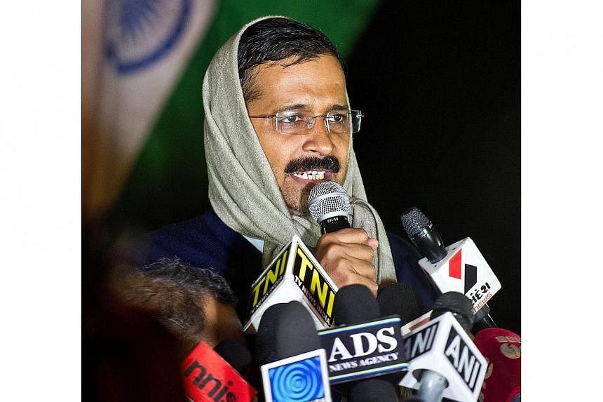 Delhi's then-chief minister Arvind Kejriwal addresses media at the venue of his sit-in protest in New Delhi&nbsp;on Jan 21, 2014. -- PHOTO: AFP