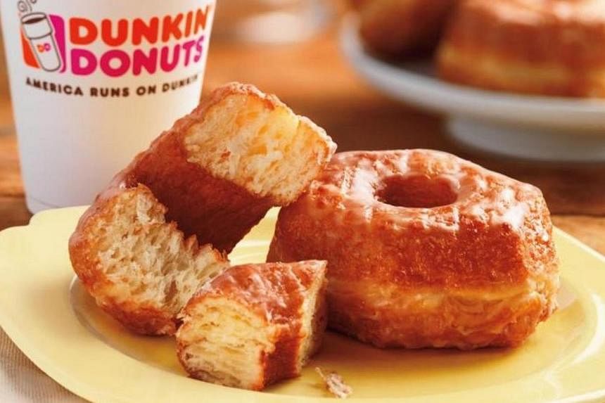 Dunkin' Brands Group said this year's sales at its coffee shops will not be as strong as expected as more chains compete in the fast-food breakfast business. -- PHOTO: DUNKIN' DONUTS