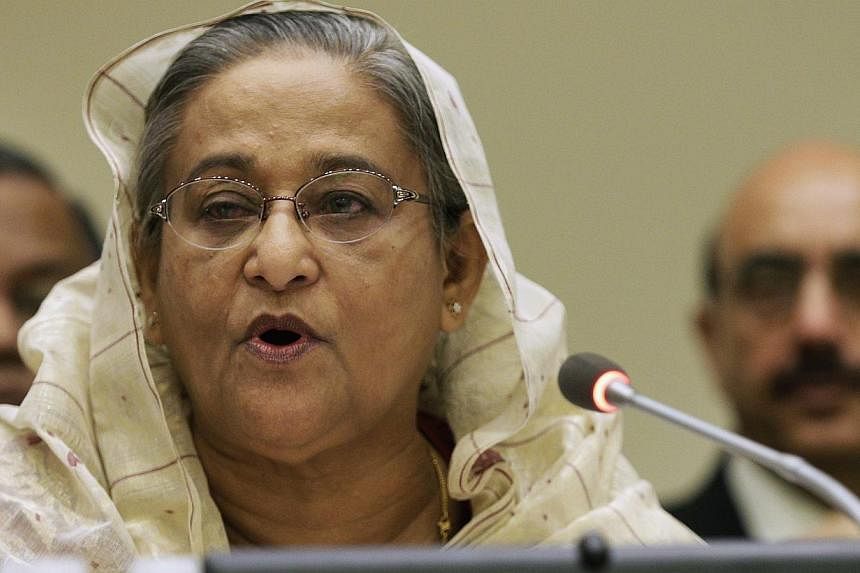 Bangladesh's Prime Minister Sheikh Hasina addresses a high-level summit on strengthening international peace operations during the 69th session of the United Nations General Assembly at United Nations headquarters in New York Sept 26. India's top cou
