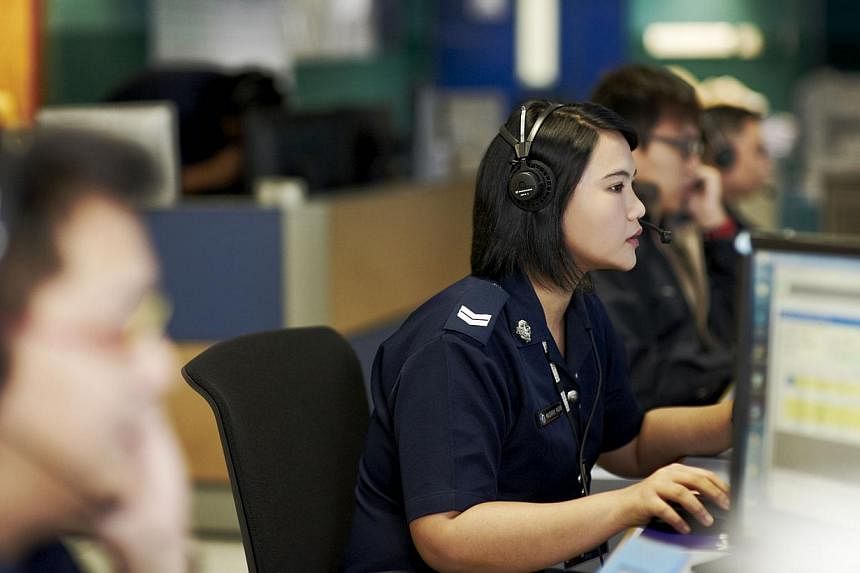 Police officers manning the 999 emergency hotline calls that require immediate police attention.&nbsp;If you receive a phone call from the number 999, ignore it and make a police report. -- PHOTO:&nbsp;SINGAPORE POLICE FORCE