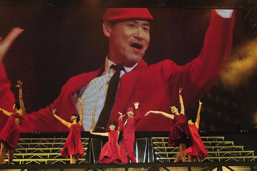Hong Kong pop singer Jacky Cheung performing at his 1/2 Century Tour in Singapore.&nbsp;-- PHOTO:&nbsp;UNUSUAL ENTERTAINMENT