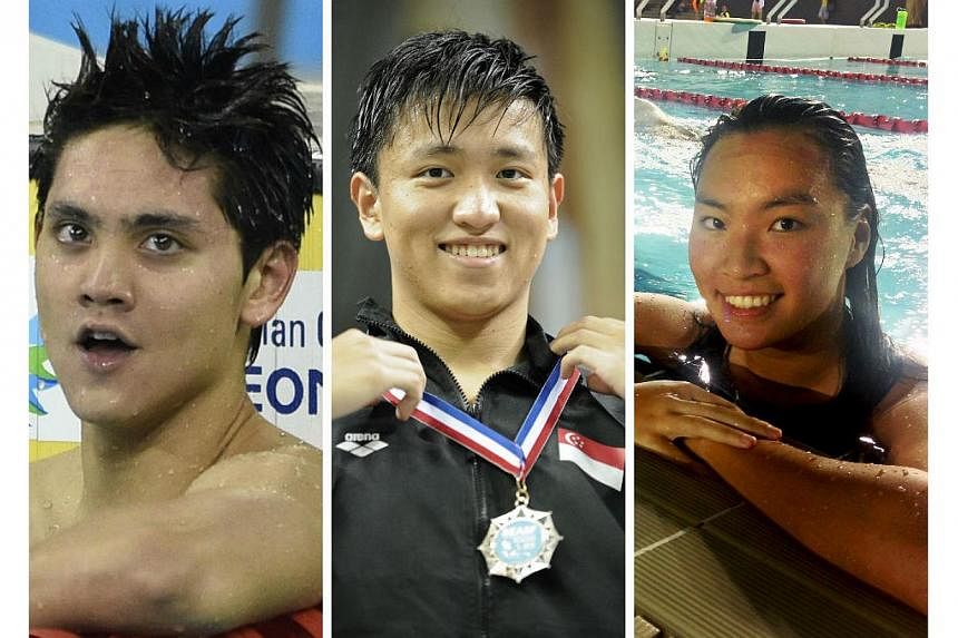 Team Singapore swimmers (from left to right) Joseph Schooling, Teo Zhen Ren and Roanne Ho. -- PHOTOS: AFP/ST FILE/TNP&nbsp;