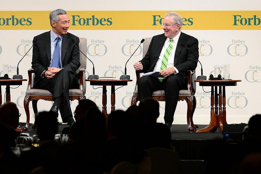 PM Lee and Mr Steve Forbes, chairman and editor-in-chief of Forbes Media, at the three-day Forbes Global CEO Conference, which brings business leaders together to discuss global economic issues.