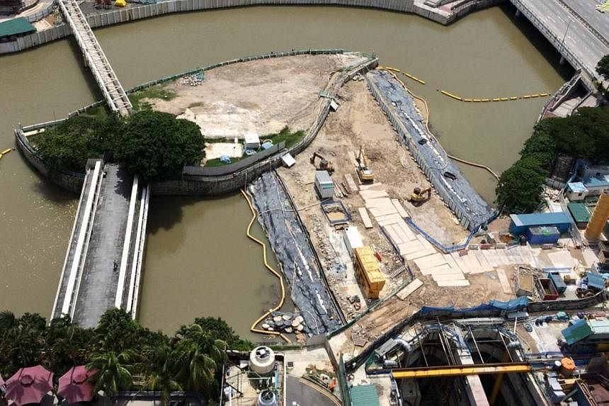 The Singapore River and its surroundings as seen before the diversion works began (above left), in November 2012 (top left) and this year (right). The process involved demolishing parts of the old river embankment while building a series of dams, har