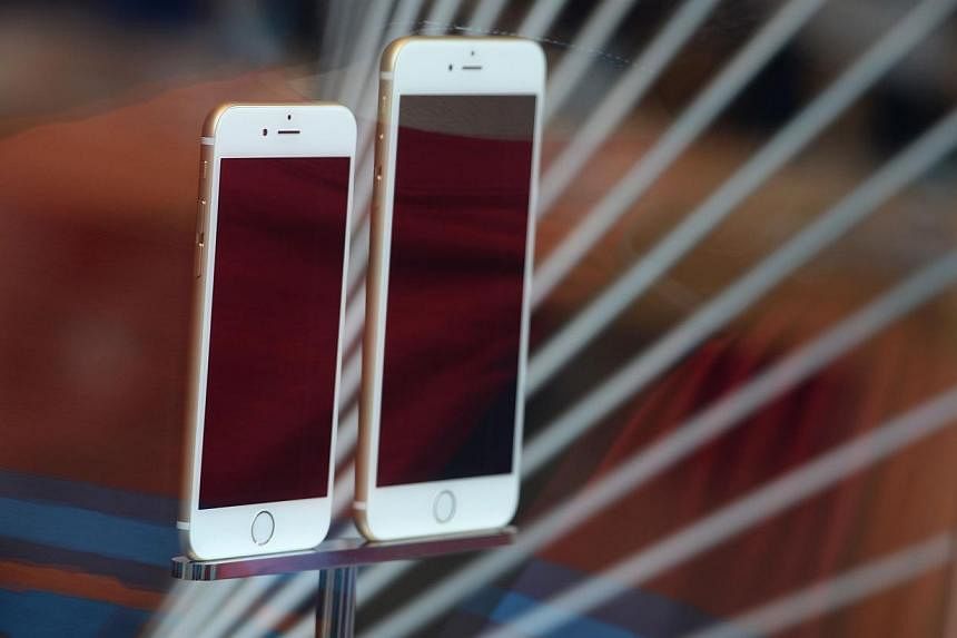 Apple is in preliminary talks to sell the iPhone in Iran, if sanctions are eased on the Middle East nation, the Wall Street Journal reported on Wednesday. -- PHOTO: AFP
