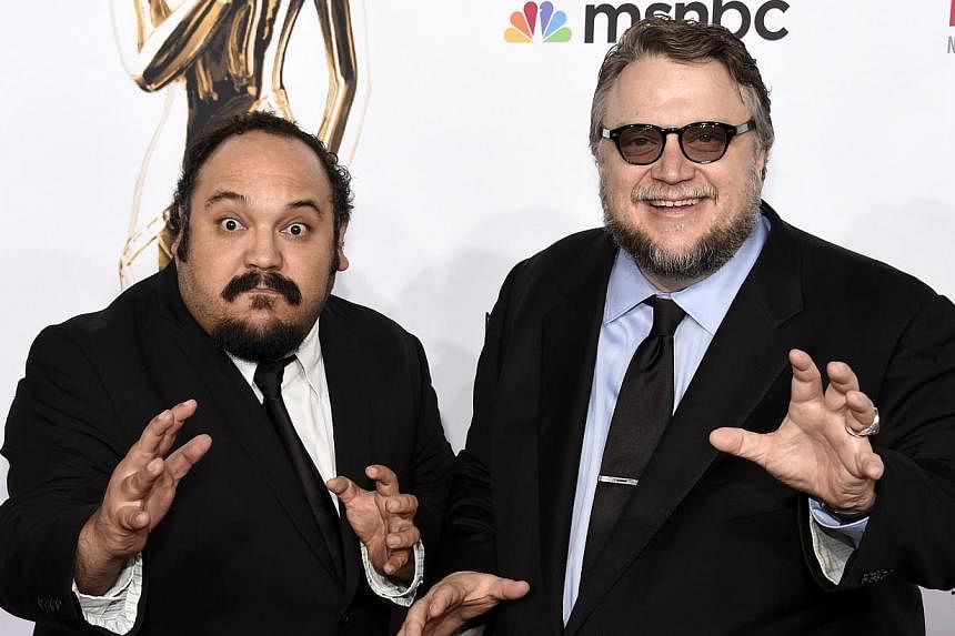 “The secret is that when you’re talking about death, you’re talking about life. And that is the message in the movie.” - Producer Guillermo del Toro (right), on The Book Of Life, which is written and directed by Jorge Gutierrez (left) -- PHOT