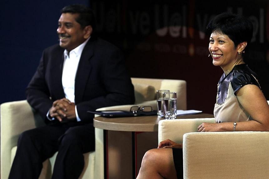 Senior Minister of State for Law and Education Indranee Rajah and former Nominated MP and moderator Viswa Sadasivan at the NUS U@live forum yesterday. She stressed that parties other than the Government, ranging from bosses to teachers, must believe 