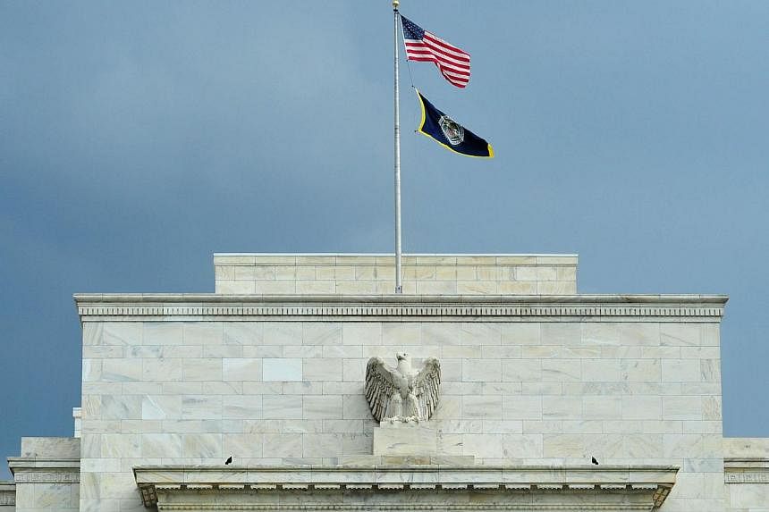 The Federal Reserve decided Wednesday to end its quantitative easing (QE) stimulus programme, after six years of pumping money into the economy via asset purchases to shore up growth.Here are five things to know about QE. -- PHOTO: AFP
