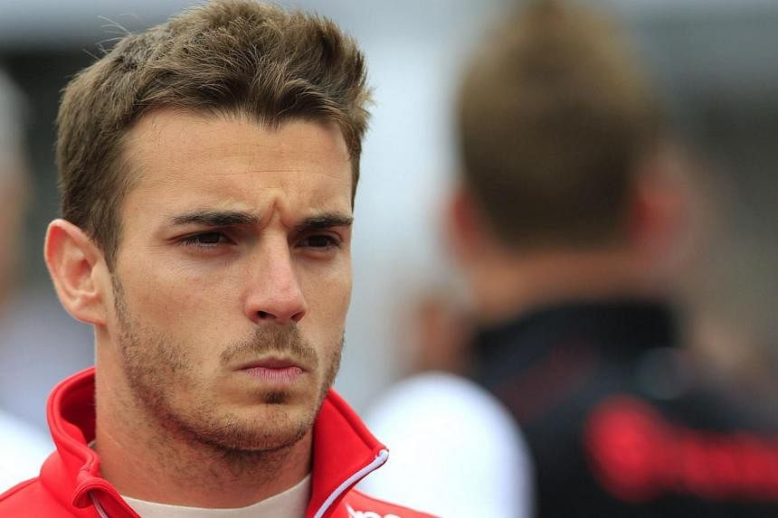 Injured Formula One driver Jules Bianchi, seen here (above) in Monte Carlo in May 2014, remains in a critical but stable condition, the Frenchman's family said on Thursday. -- PHOTO: AFP