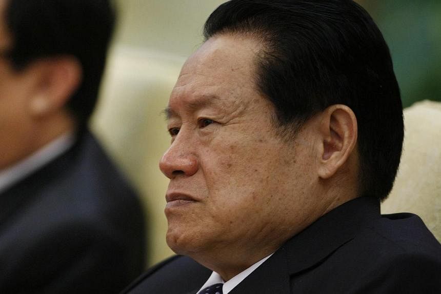 China's Communist Party made no mention of the fate of China's powerful former domestic security chief Zhou Yongkang at a recent key meeting because he is no longer part of the central leadership, a senior party official said on Thursday. -- PHOTO: R