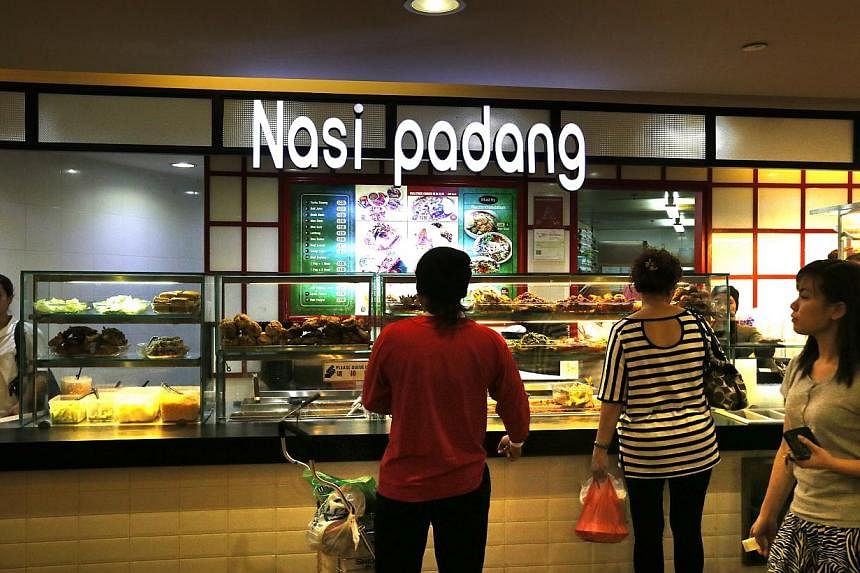 The National Environment Agency (NEA) will take legal action against a Nasi Padang stall located in Northpoint Shopping Centre. -- ST PHOTO:&nbsp;CHEW SENG KIM
