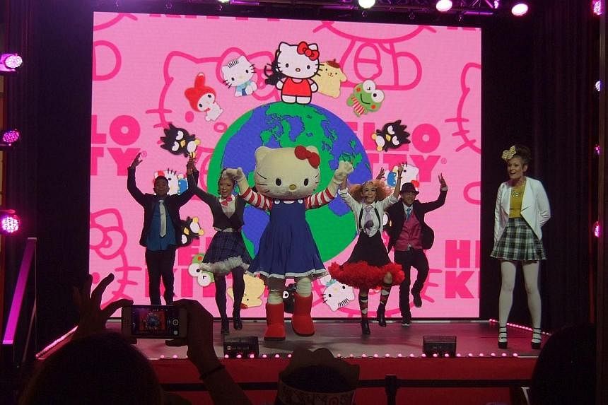 Hello Kitty takes to the stage for a dance performance at the world’s first Hello Kitty convention in Los Angeles on Thursday. -- PHOTO:&nbsp;ALISON DE SOUZA