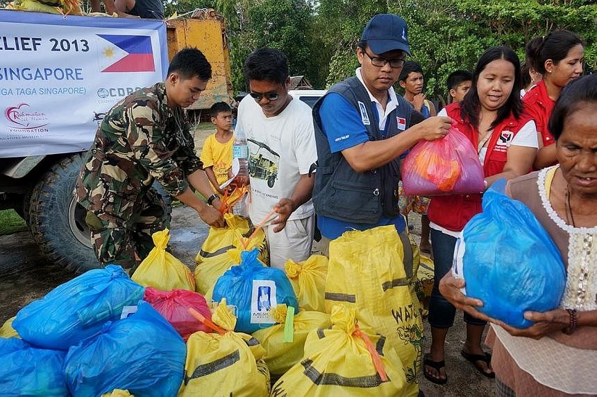 Singapore's Mercy Relief, an independent non-governmental humanitarian charity, providing aid to those affected in Visayas, Philippines after typhoon Haiyan swept into the country on Nov 8, 2013.&nbsp;Companies can now play a bigger role in humanitar