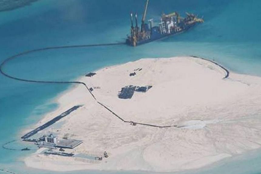 A photograph taken in February of the Johnson South Reef in the South China Sea, a reef occupied by China but also claimed by the Philippines and Vietnam. According to the Philippine Foreign Affairs Department, this photo appears to show large-scale 