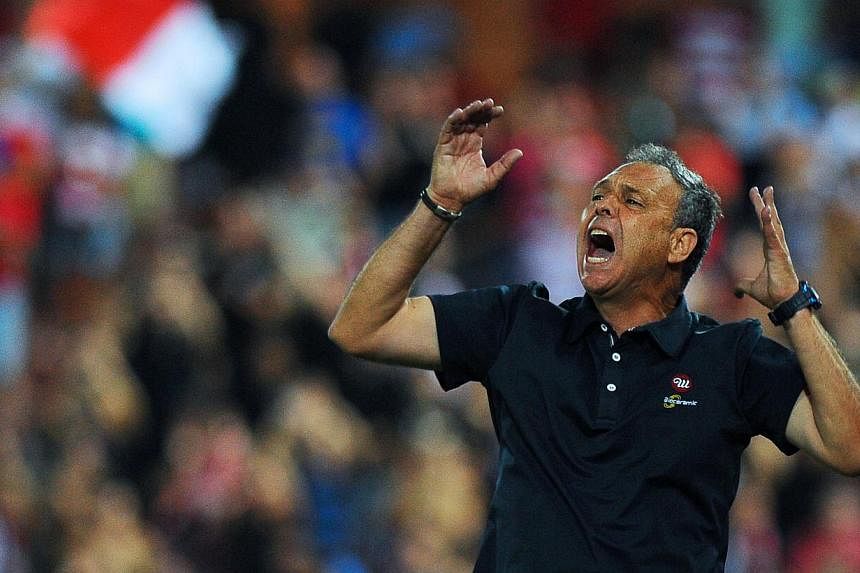 Granada coach Joaquin Caparros (above) tore the front page of Marca into shreds at a news conference on Friday, accusing the best-selling Spanish sports daily of misquoting him. -- PHOTO: AFP