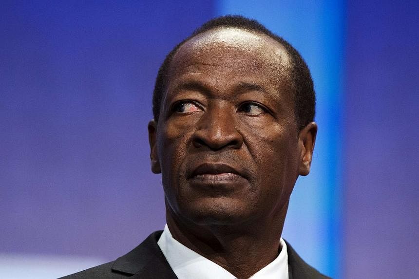 Burkina Faso's President Blaise Compaore sits on a stage to support a commitment to stop poaching of African elephants at the Clinton Global Initiative (CGI) in New York, in this file picture taken Sept 26, 2013. President Compaore said on Thursday t
