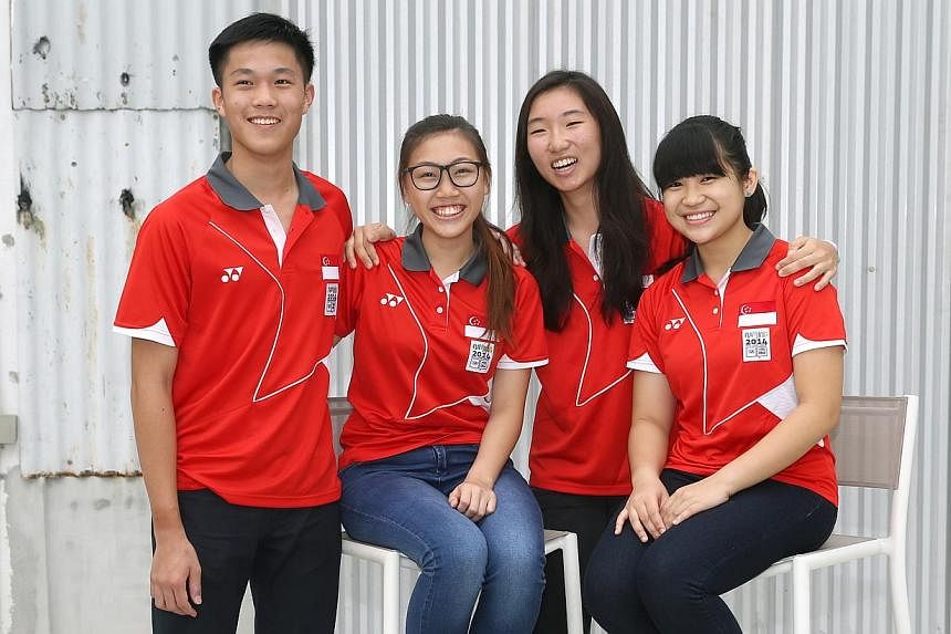 Singapore's four medallists at the Youth Olympic Games (YOG) in Nanjing this August, (from left) sailor&nbsp;Bernie Chin, shooter Teh Xiu Yi, sailor Samantha Yom and shooter Martina Lindsay Veloso,&nbsp;received sports scholarships from NTUC FairPric