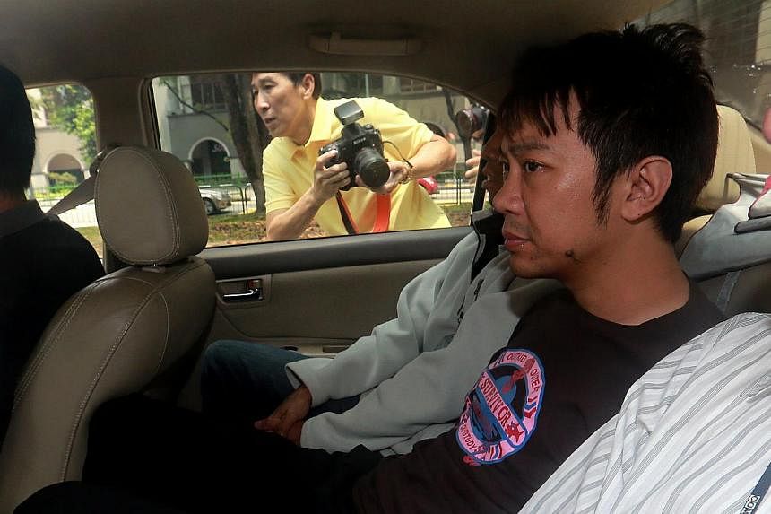 Former China tour guide Yang Yin, who is embroiled in a legal tussle over the assets of a wealthy 87-year-old widow was charged in court on Friday. -- ST PHOTO: WONG KWAI CHOW