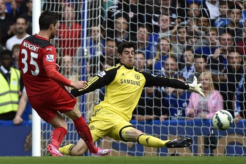 Thibaut Courtois reckons Chelsea are capable of achieving what the Belgium goalkeeper came agonisingly close to doing at Atletico Madrid last season - winning a European and domestic double. -- PHOTO: REUTERS&nbsp;