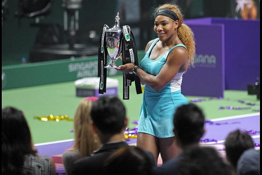 American tennis ace Serena Williams with the trophy after winning the BNP Paribas WTA finals in Singapore last weekend. In tennis, as in Formula One racing, data analytics is increasingly becoming a vital component contributing to overall performance