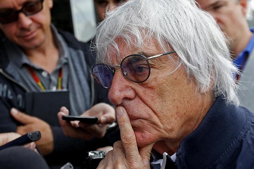 Formula One's commercial ringmaster Bernie Ecclestone (above, in August) warned on Friday that the sport's financial crisis could reduce the grid to 14 cars in 2015.&nbsp;After the withdrawal of both the Caterham and Marussia teams for this weekend's