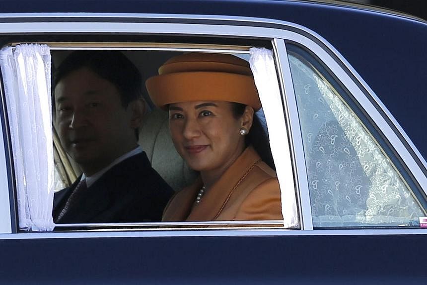 Japan's Crown Princess Masako (right) and Crown Prince Naruhito leave a welcoming ceremony for King Willem Alexander and Queen Maxima of the Netherlands at the Imperial Palace in Tokyo on Oct 29, 2014. King Willem Alexander and Queen Maxima are in Ja