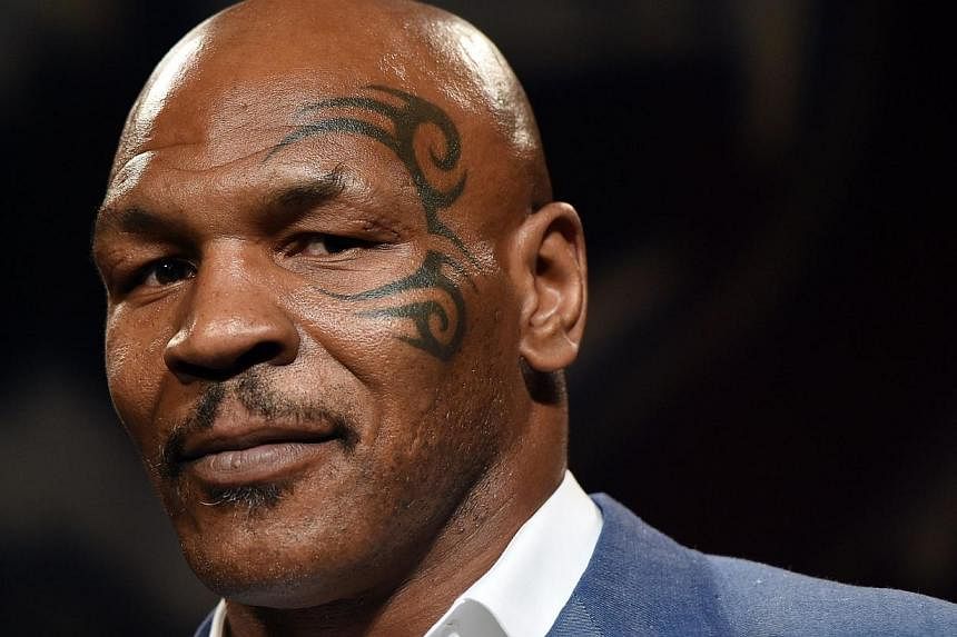 Former heavyweight champion Mike Tyson - seen here (above) in Las Vegas on Aug 9, 2014 - &nbsp;was sexually abused when he was seven years old by a stranger on the street, he told US radio. -- PHOTO: AFP
