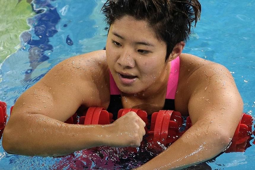 Singapore swimmer&nbsp;Tao Li clinched a silver in the 50m butterfly, touching home in 25.72 seconds, at the Fina/Mastbank Swimming World Cup at the OCBC Aquatic Centre on Sunday. -- PHOTO: ST FILE