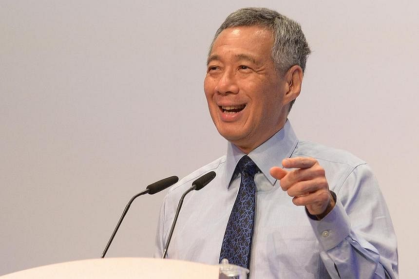 PM Lee Hsien Loong speaking at the launch of the inaugural National Productivity Month on Oct 7, 2014. He announced on Monday that the Government has set up a $30 million fund to help Singaporeans master skills for the future. -- ST PHOTO:&nbsp;JAMIE