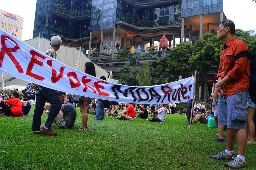 A banner on display during a peaceful protest held at Hong Lim Park on 8 June 2013.&nbsp;Asked for an account of the Sept 27, 2014 incident in Hong Lim Park where protestors had allegedly disrupted a nearby charity carnival, National Development Mini