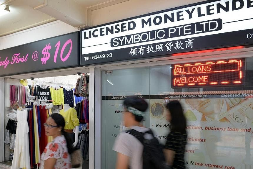 An advisory committee on moneylending has suggested implementing caps on how much a person can borrow from licensed moneylenders, as well as on the interest rates applied by the moneylenders. -- PHOTO: ST FILE