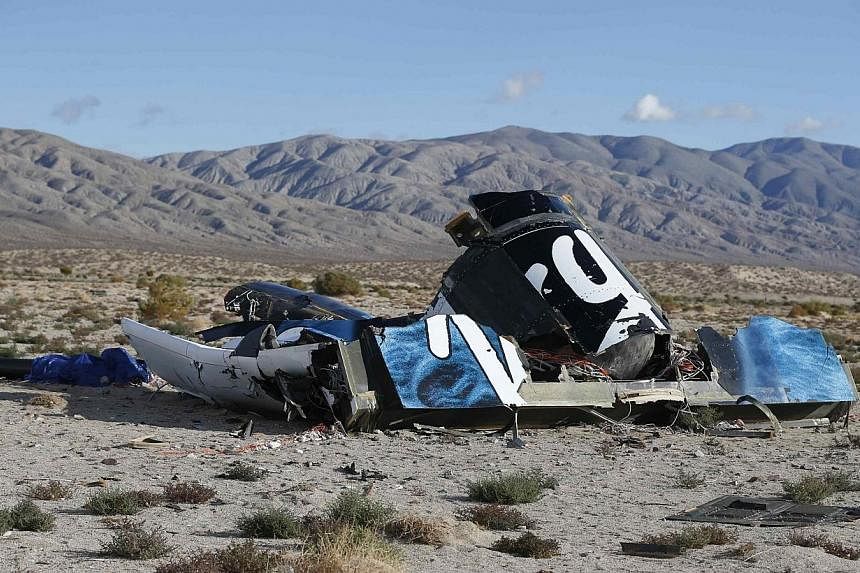 A piece of debris is seen near the crash site of Virgin Galactic's SpaceShipTwo near Cantil, California on Nov 1, 2014. -- PHOTO: REUTERS