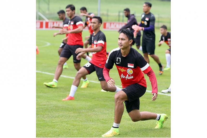National football team captain Shahril Ishak (right) and winger Faris Ramli (second from right) at their training camp in Almdorf Flachau in Salzburg, Austria. -- PHOTO: FAS