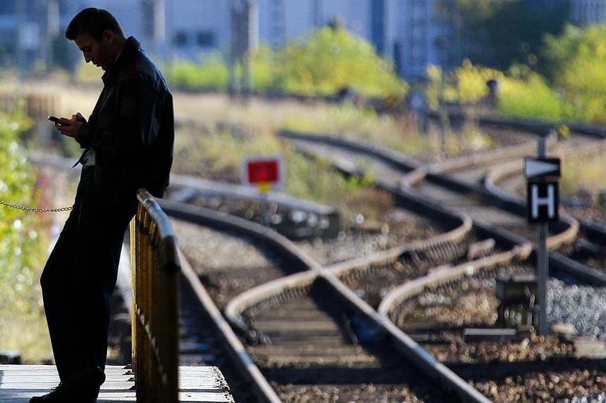 A man stands on a platform at Ostbahnhof Station in Berlin on Oct 19, 2014.&nbsp;-- PHOTO: REUTERS
