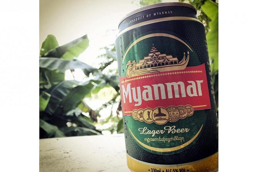 The Myanmar military company behind a sprawling business empire has tried to reassure foreign investors after it won a legal tussle to buy out its Singaporean brewery partner Fraser &amp; Neave. -- PHOTO: ST FILE