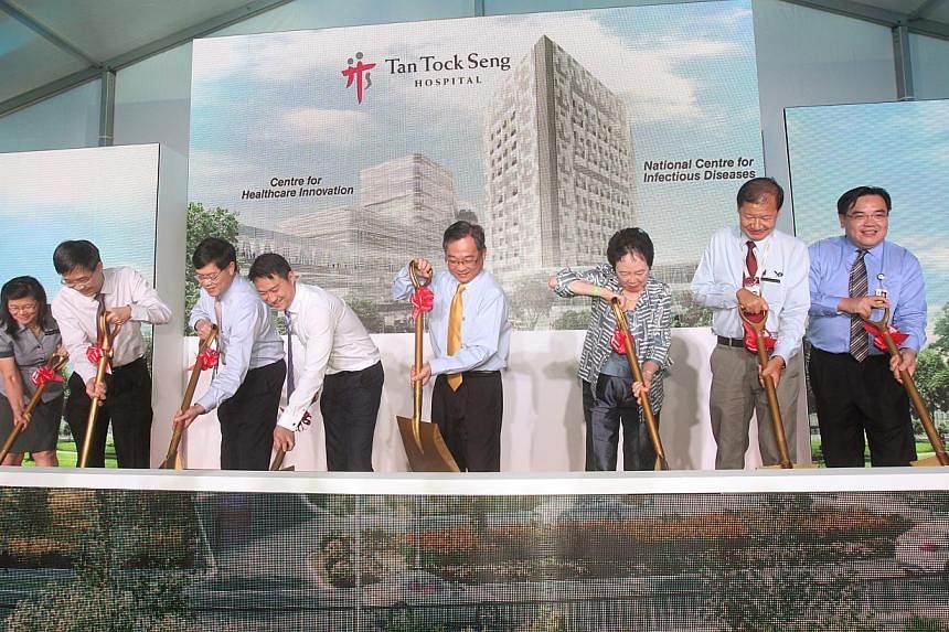 Minister of State for Health Lam Pin Min and Health Minister Gan Kim Yong (fourth and fifth from left) at the groundbreaking ceremony of Tan Tock Seng Hospital's new National Centre for Infectious Diseases and Centre for Healthcare Innovation on Nov 
