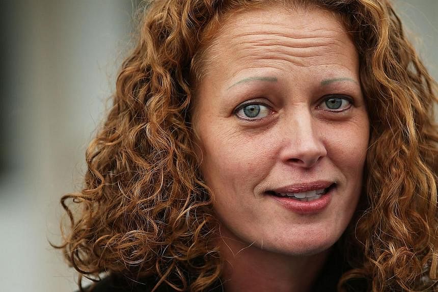 Kaci Hickox gives a statement to the media in front of her home in Fort Kent, Maine&nbsp;on Oct 31, 2014. -- PHOTO: AFP